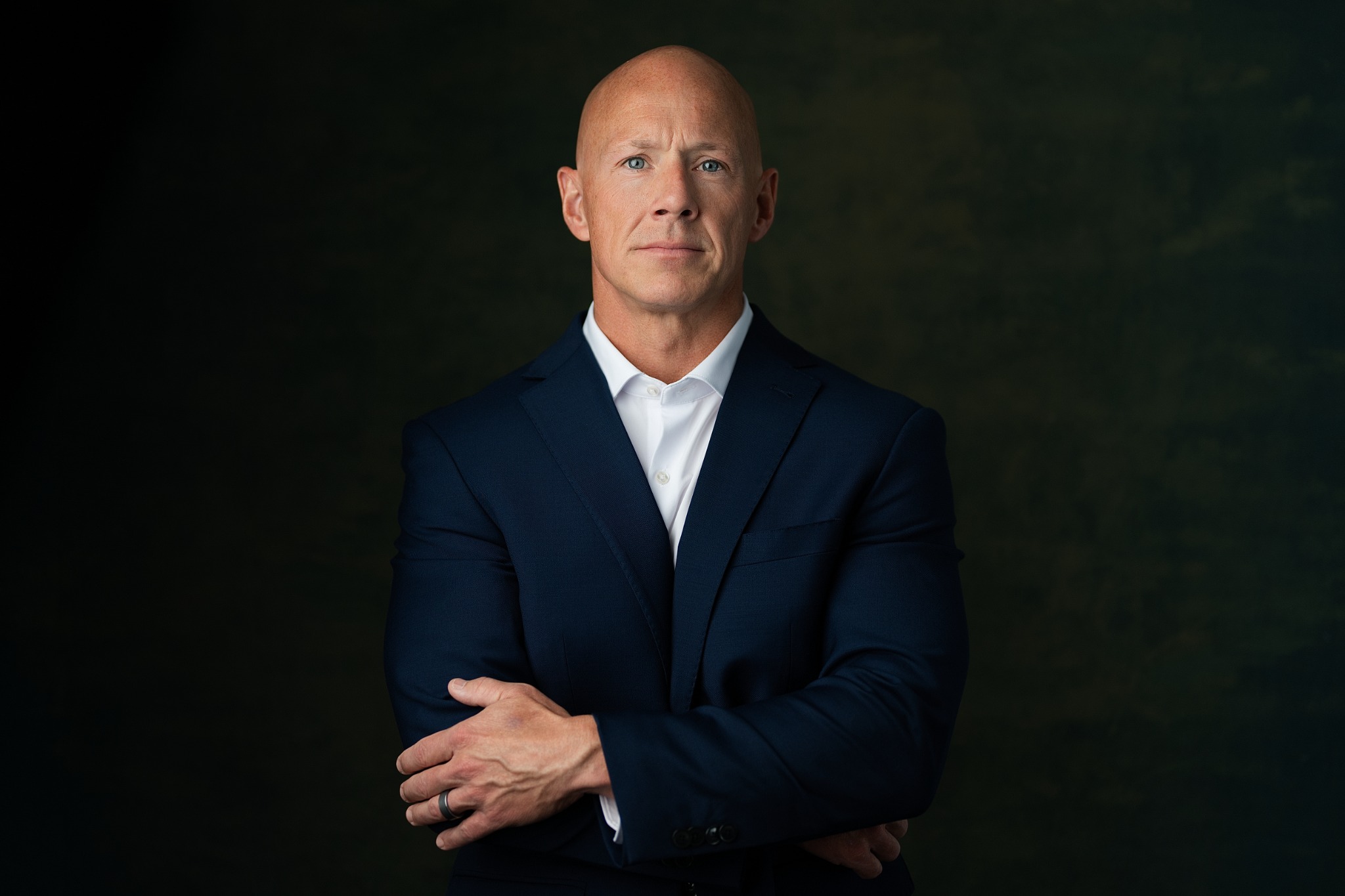 Brian Flanigan in a navy suit
